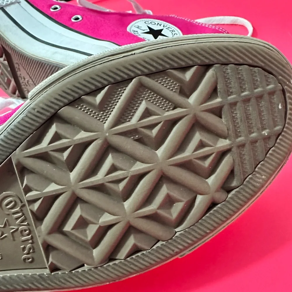 Pink high top platform converse